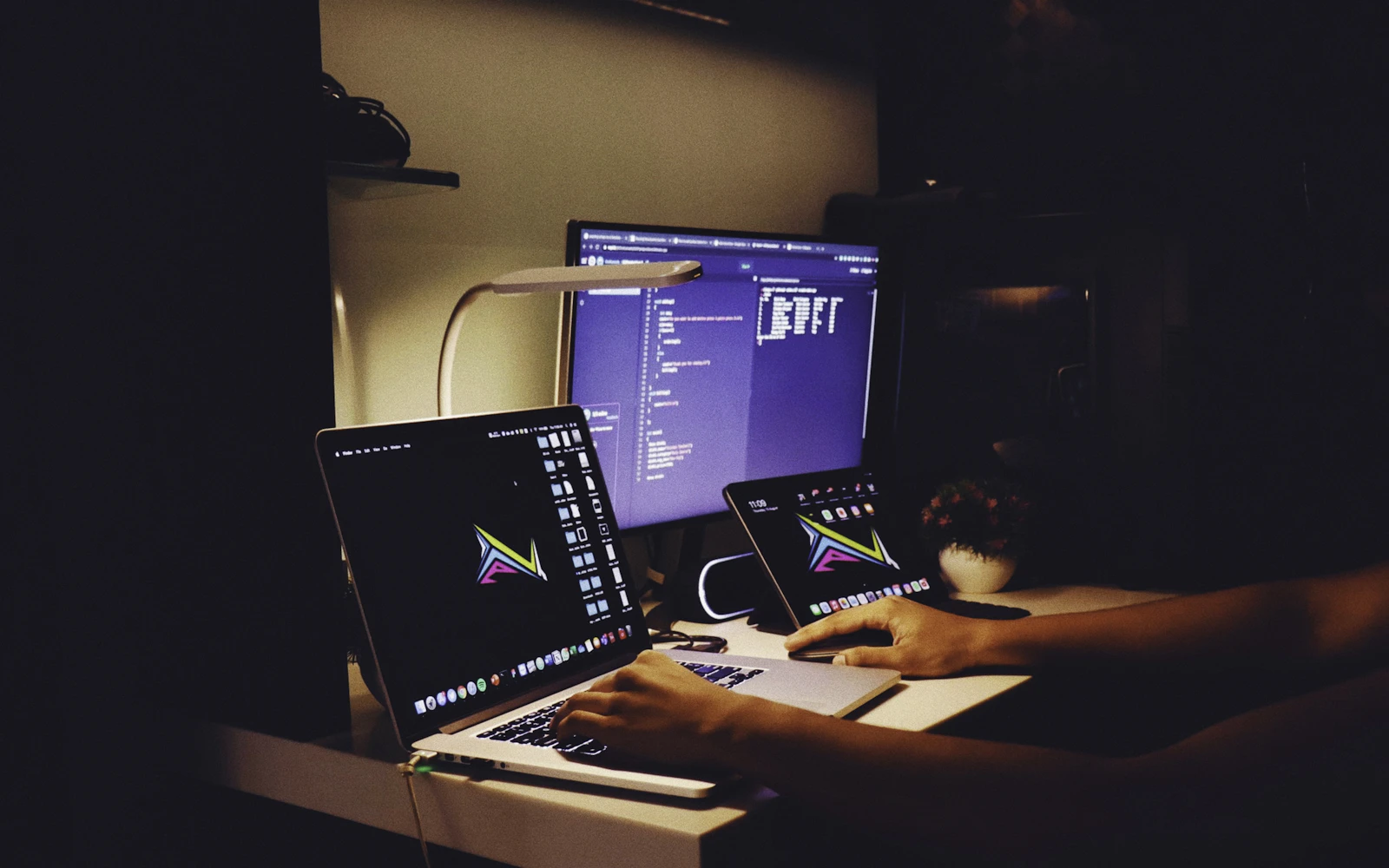 Hands at work on a laptop — the craft behind every build